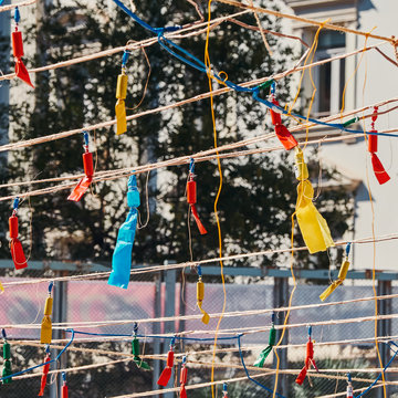 Preparation of the mascleta in the Fallas of Valencia. The pyrotechnic objects, called masclets, hung on ropes, inside a cage, will be exploited every day during the festival of the Valencian fallas 