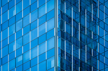Obraz premium Glass of modern tower for business background, blue tone
