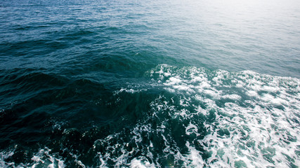 Blue and turquoise water with irregular wave structure