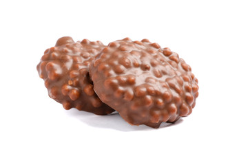 Chocolate cookies with caramel filling isolated on white background