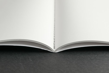 Clean copybook on black background, space for text