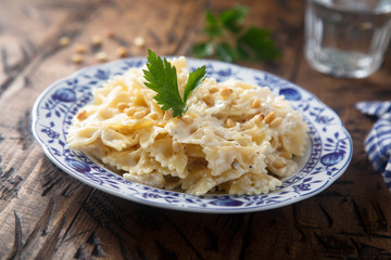 Pasta with pine nuts and cream sauce