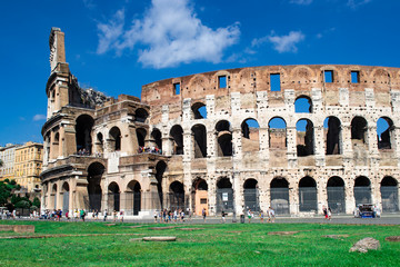 Visiting the Colosseum in a sunny day