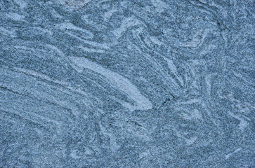 Granite wall with azure or bluish tint as background