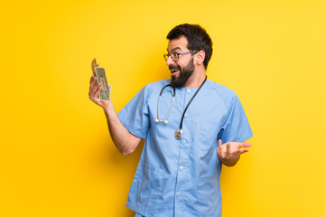 Surgeon doctor man taking a lot of money