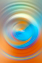 Blue and orange spinning circle background