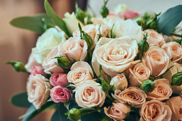 beautiful bridal wedding bouquet lying on the table