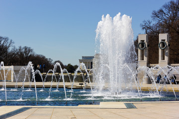 Northern tall-fountain of the Rainbow Pool with the Lincoln Memorial behind, National Mall,...