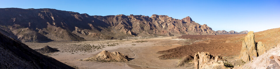 Panorama picture of the extensive and barren lava landscape near the volcano El Teide on Tenerife, Spain