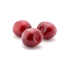Photo of red cherries isolated on white background