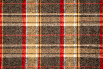 Tartan plaid natural cotton fabric. Seamless tiles texture for the background