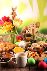 Obraz na płótnie Canvas breakfast on table with bread buns, croissants, coffe and eggs
