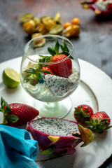 whipped cream with strawberries and dragon fruit