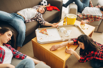 Football fans sleep after alcohol party at home