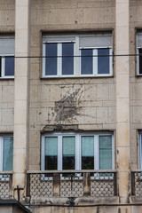 Traces of shots remaining on the facade of a residential building in Sarajevo after the war. Bosnia and Herzegovina