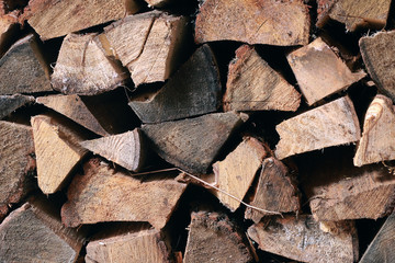 Heap firewood stack. Logs.