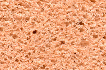 The texture of the bread. Porous surface and texture of the cut edge of the bread closeup