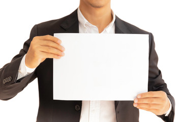 Businessman holding white clear paper board in hands isolated in clipping path.