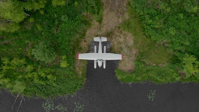 Seaplane by lake shore parked Alaska water plane