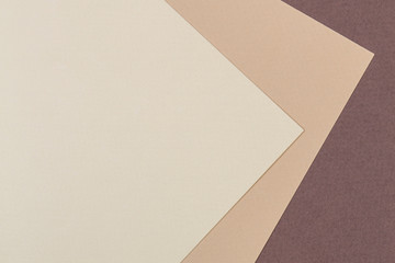 Color papers geometry composition background with beige and brown color tones