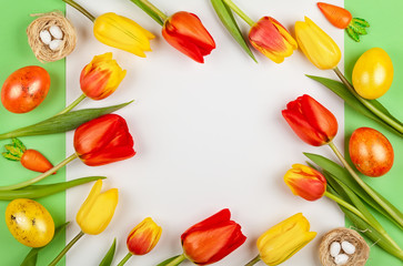 Beautiful red  tulips flowers and Easter eggs  for holiday.