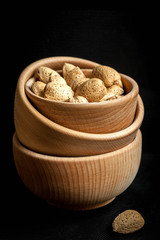Almonds in a wooden bowl.