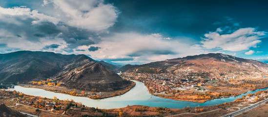Mtskheta, Georgia. Top View Of Ancient Town Located At Valley Of Confluence Of Rivers Mtkvari Kura And Aragvi In Picturesque Highlands. Autumn Season © Great Brut Here