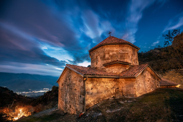 Mtskheta, Georgia. Shio-mgvime Monastery. Church Of Holy Virgin Or Theotokos In Medieval Monastic Shiomgvime Complex In Limestone Canyon Under Autumn Night Sky