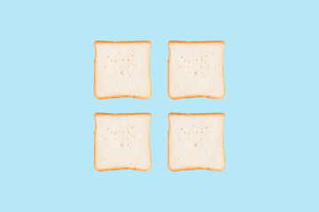 Set of four sliced toast bread isolated on blue background