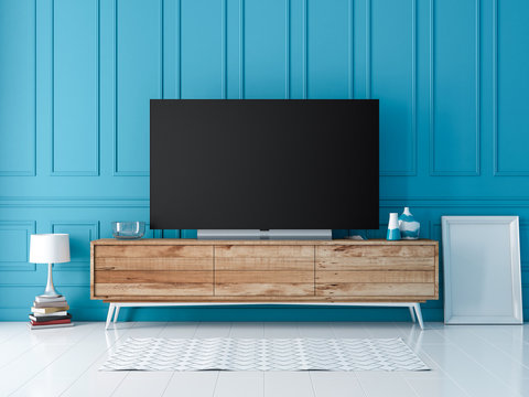 Smart Tv Mockup Standing On Console In Modern Interior With Blue Wall