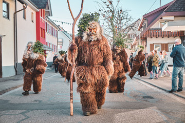 Hairy wild man. Carnival party in southern Germany - Black Forest.