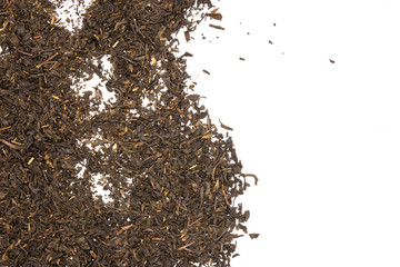 Lot of pieces of dry black tea earl grey flatlay isolated on white background