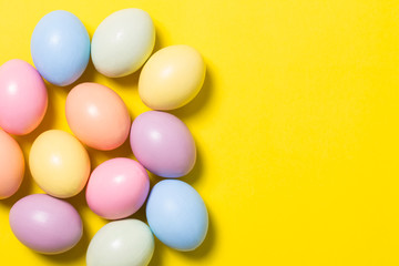 colorful easter eggs on yellow  background
