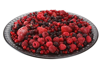 Frozen different berries on a plate. Isolated on white background.