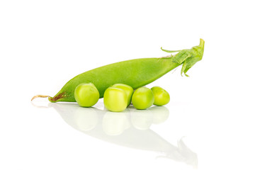 One whole green sugar snap pea pod with fresh  five peas isolated on white background