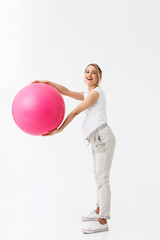 Full length of a beautiful young pregnant woman