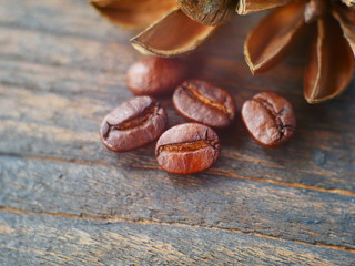 Aroma coffee beans on wooden background