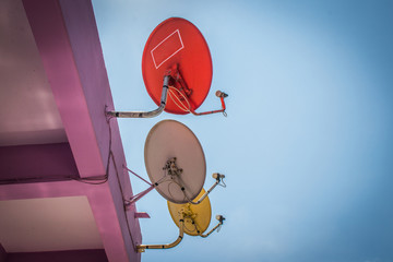 Small satellite dishes installed on the balcony for receiving high-definition television signal 