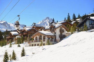 Ski resort with gondola and chalets 