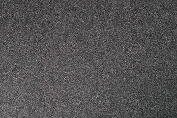 Granular abstract uniform grainy surface.