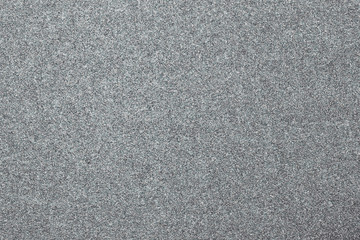 Granular abstract uniform grainy surface.