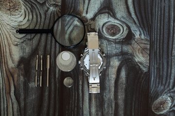 macro of replacing a watch battery with watchmaker tools / watch battery replacement