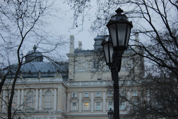 Fototapeta na wymiar Two sarinny lanterns on the background of the building.