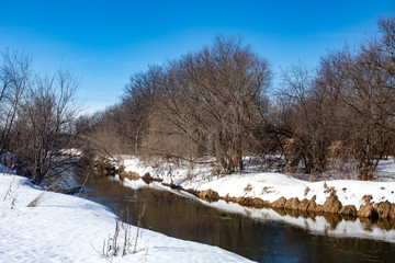The beginning of spring. Snow melts and flood starts. Sunny spring day
