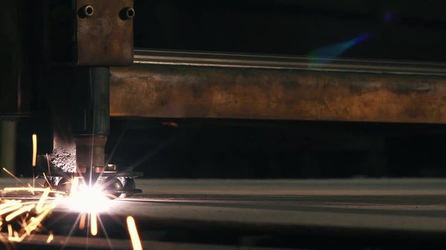 Close-up Laser Cutting Machine Cuts A Sheet Of Metal