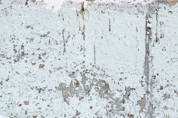 Texture of grey concrete cracked wall