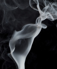 Abstract white smoke on black background
