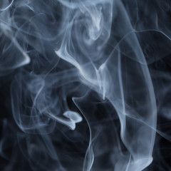 Abstract white smoke on black background