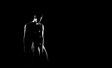 Obraz na płótnie Canvas Black and white silhouette of male ballet dancer. Long monochrom horizontal image.