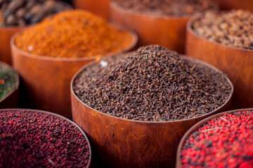 Colorful different spices, herbs in the spice market in Egypt - obrazy, fototapety, plakaty